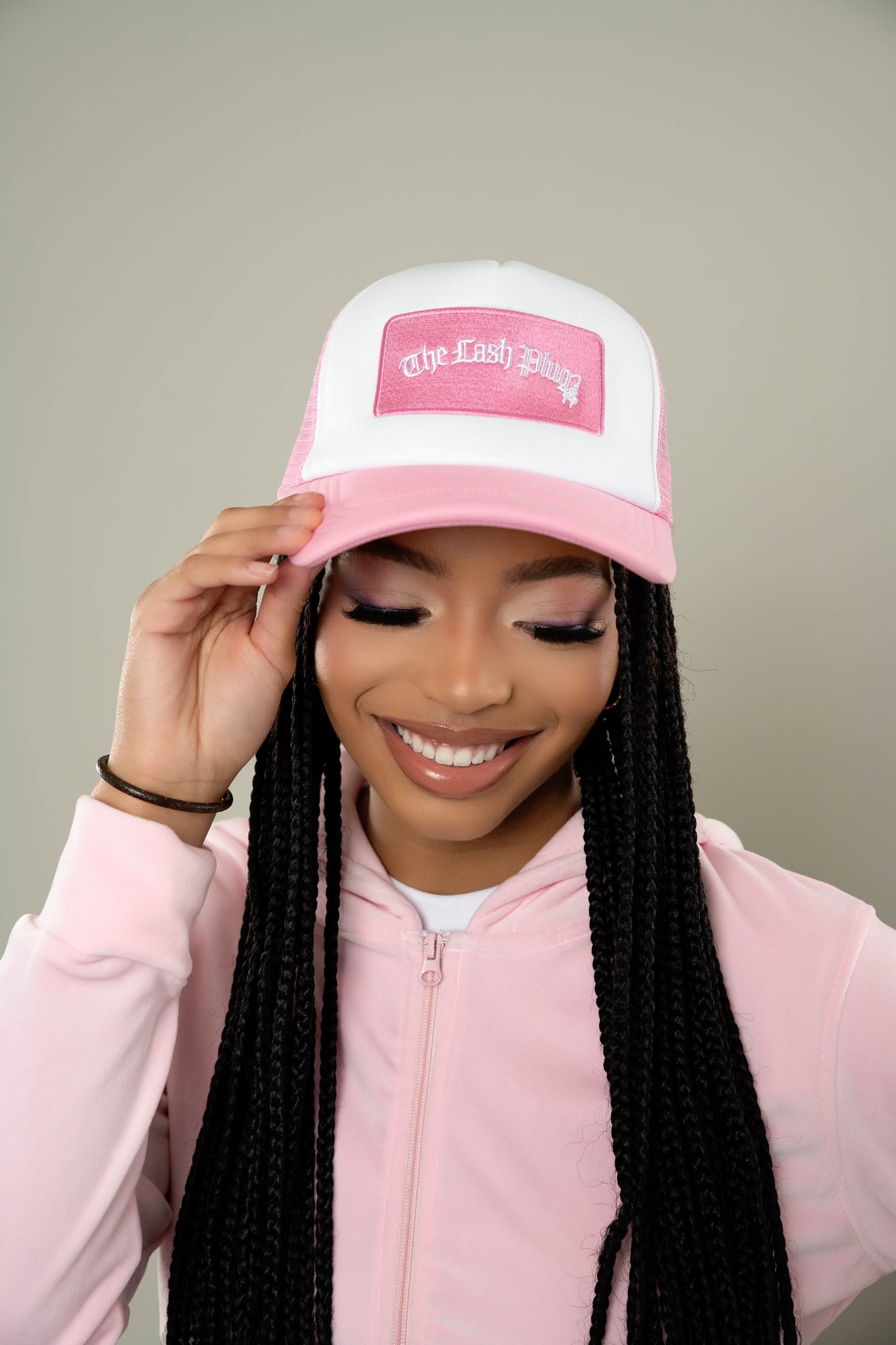 The Lash Plug Trucker Hat